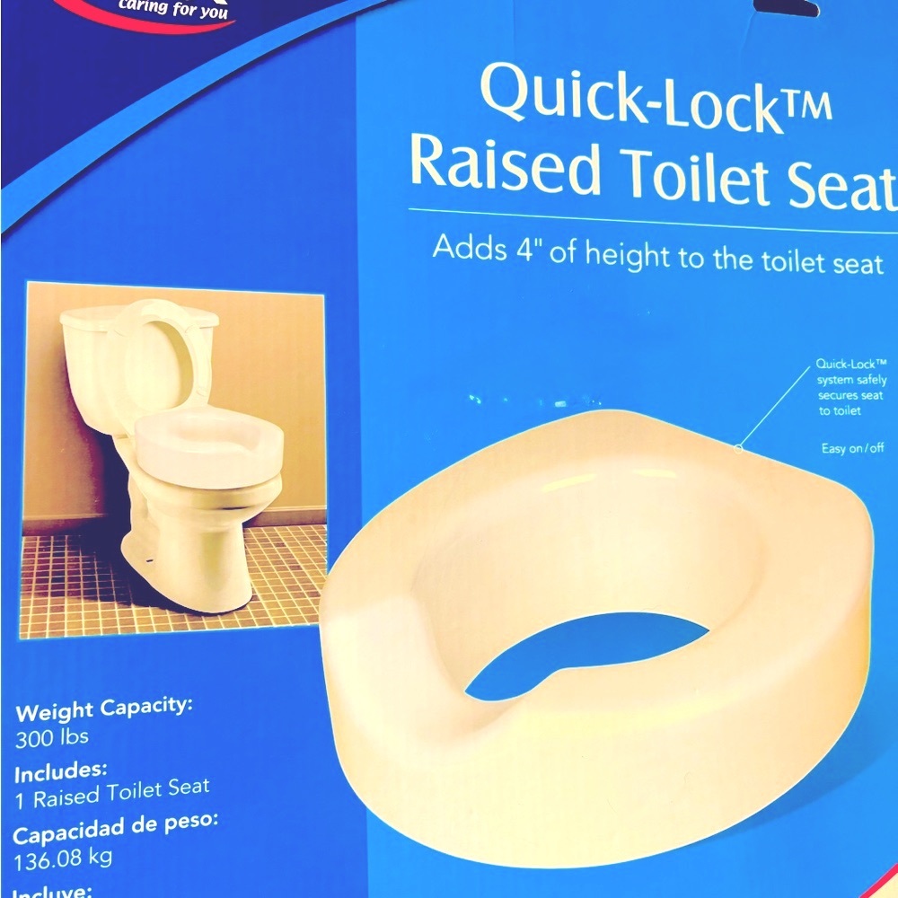 Carey raised toilet seat. Original box. Never used. No tools needed.